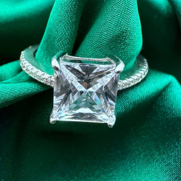 Princess cut solitare look sarvoski studded ring in 92.5 HM Silver