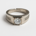 Silver ring with a large diamond and smaller diamonds on the band against a light gray background