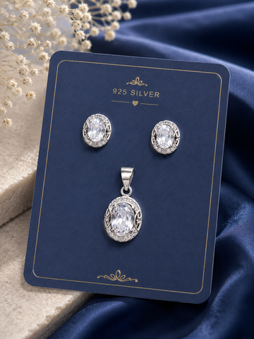 A 925 silver pendant and matching stud earrings 
