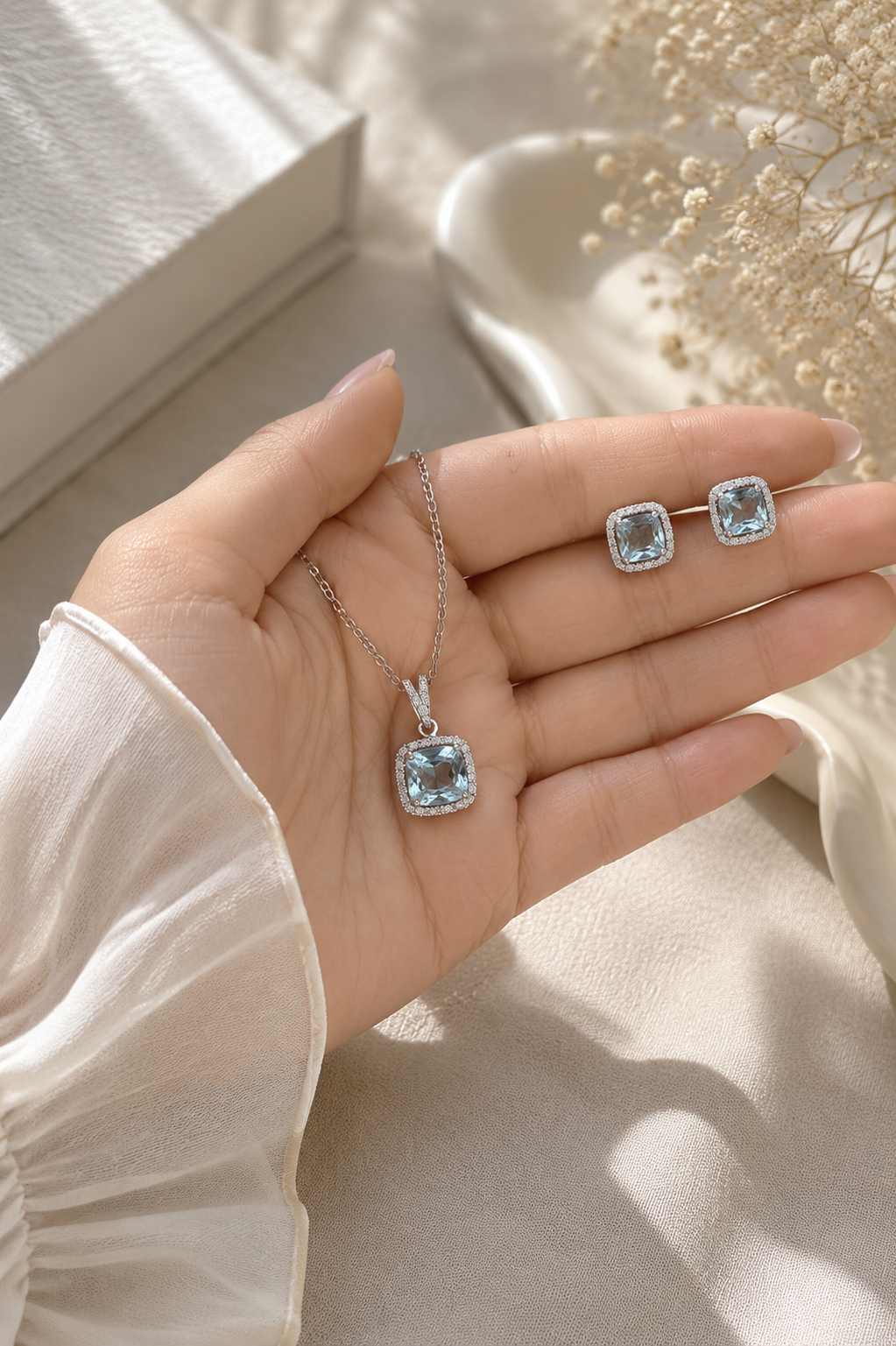 Elegant studded sarwoski pendent set with blue stone in 92.5 hm silver