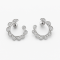 Pair of silver hoop earrings with clear gemstones on a white background