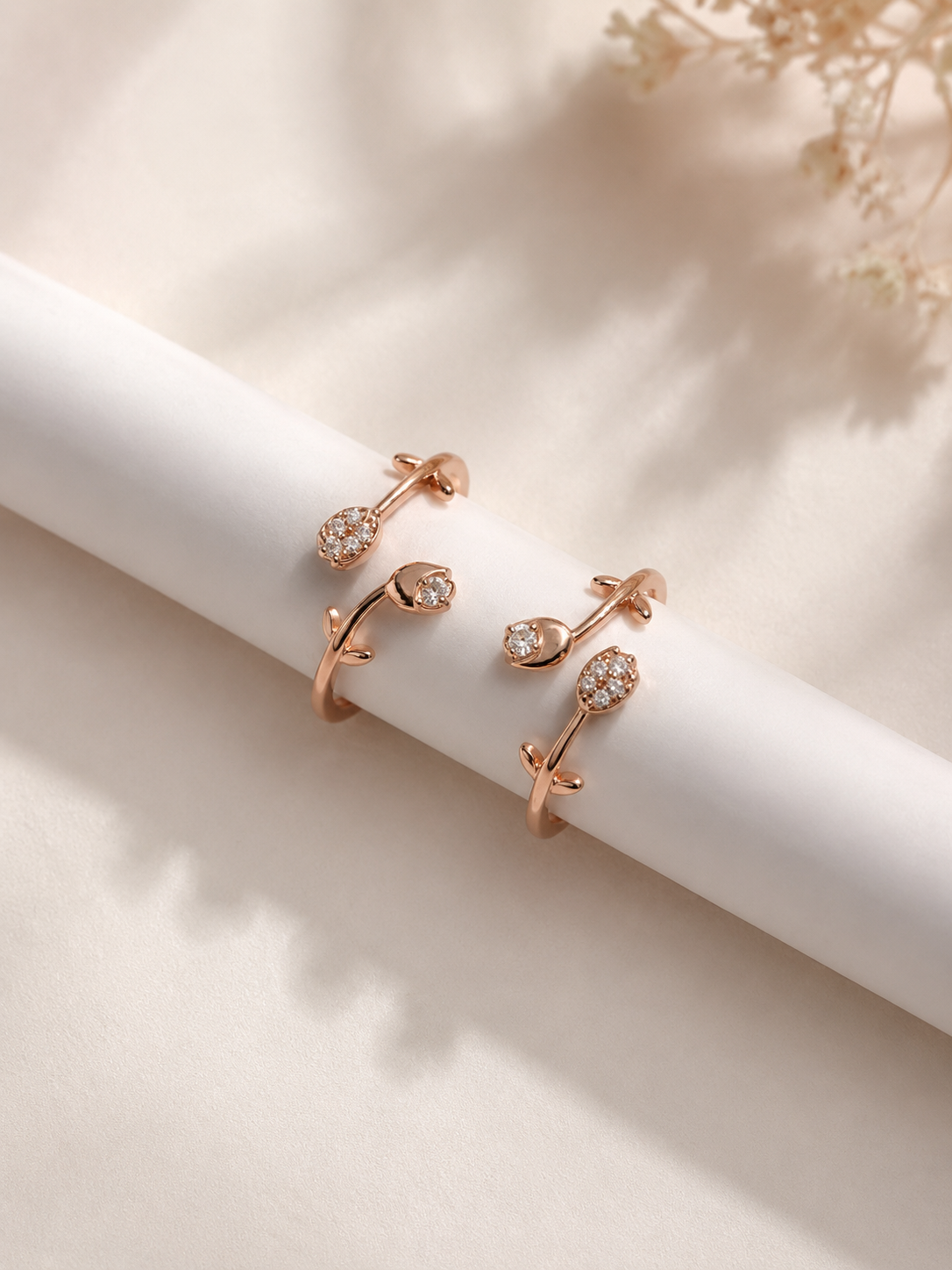 Classy Rose Gold Plated Toe Rings on Beige Background