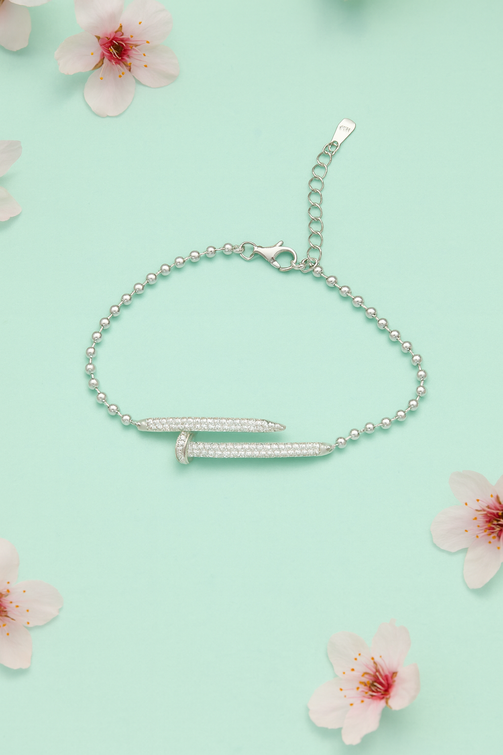 Designer inspired sterling silver nail bracelet with pavé stones