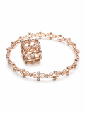Designer rose gold bracelet with flower motifs and zircon stones aesthetic photo