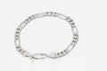 Silver chain bracelet on a white background