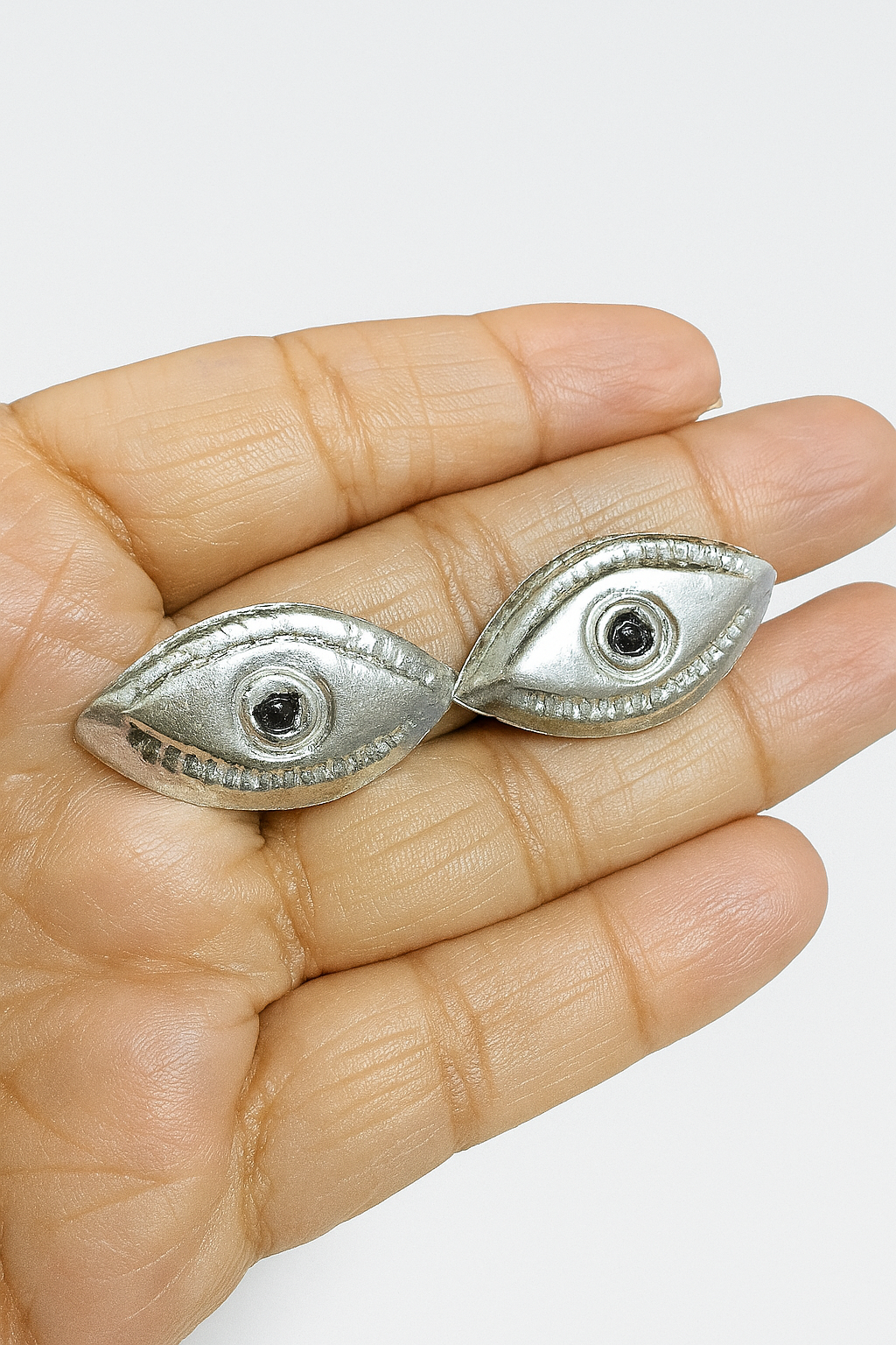 Handcrafted silver eyes for Chakshumati Puja