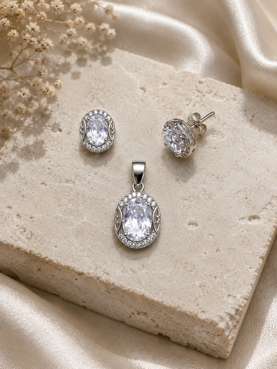 Silver-tone oval stud earrings and matching pendant 