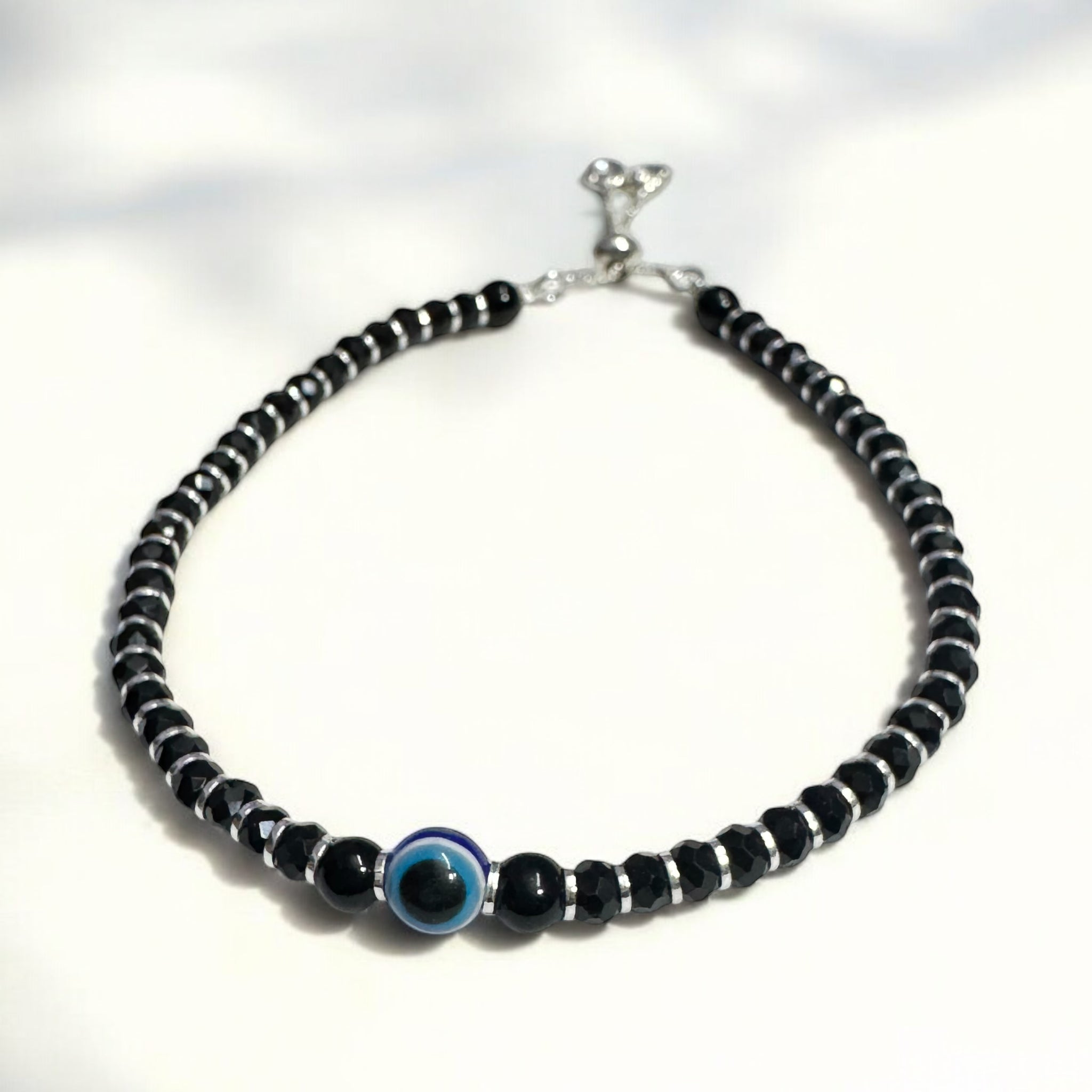 Evil Eye slider Nazariya with black beads in 92.5 HM Silver