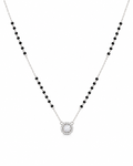 Necklace with black beads and a silver clasp on a white background