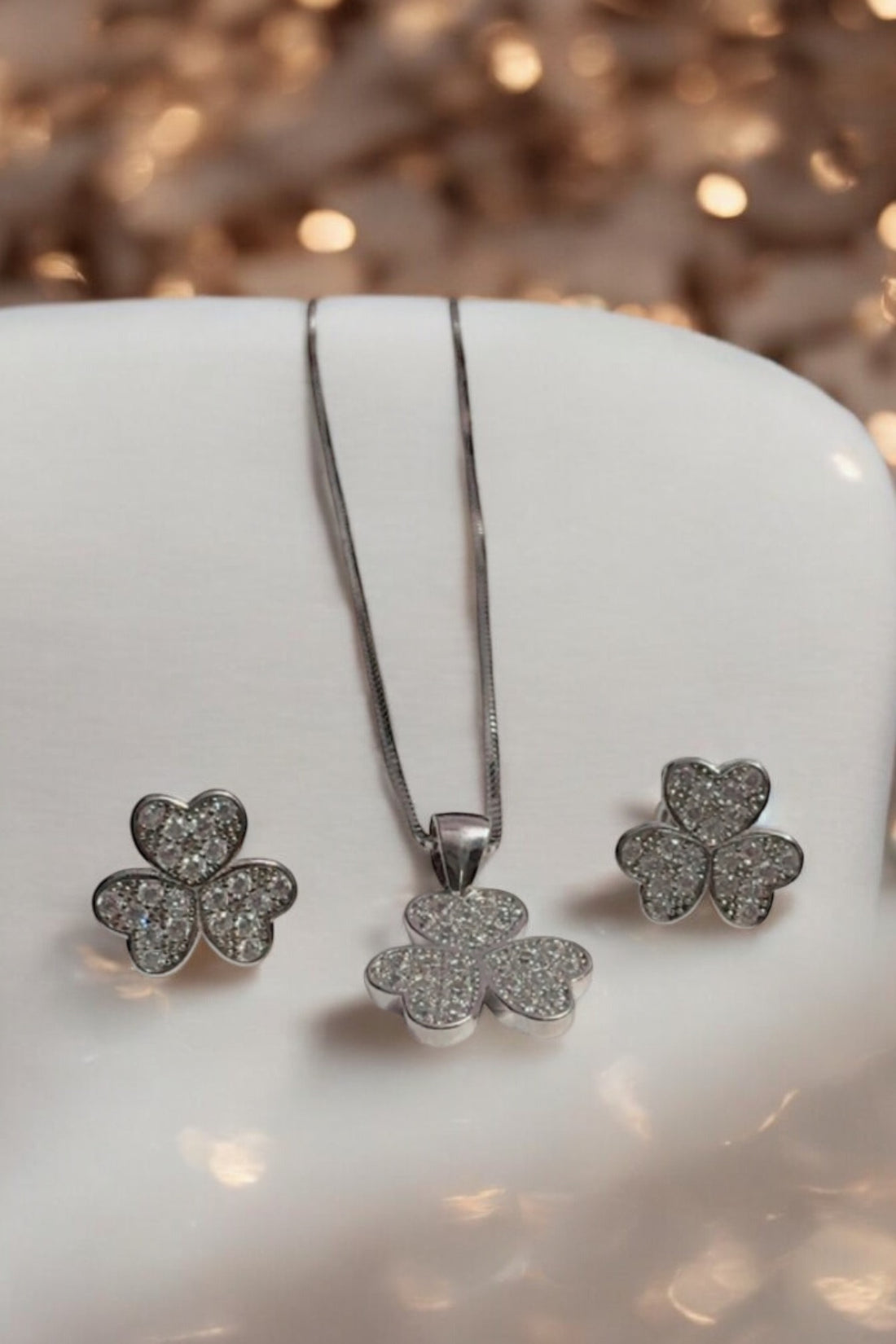 Elegant Trio: Three-Heart Pendant with Earrings in 92.5 Silver