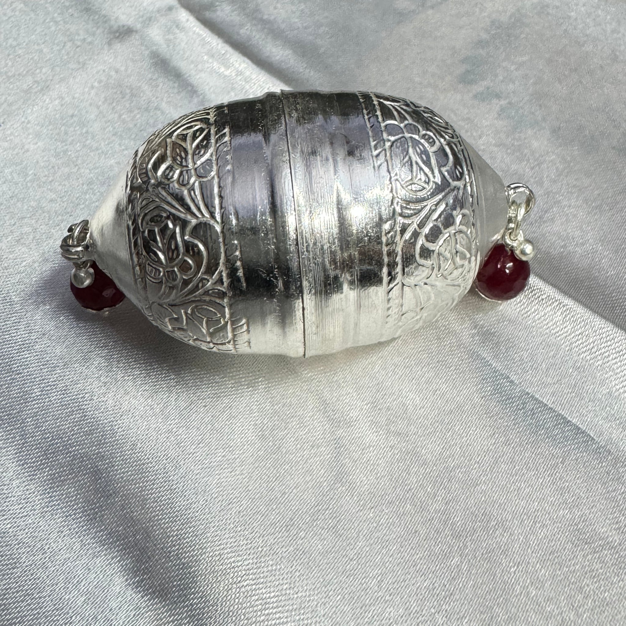 Silver Nariyal with crafted work in silver