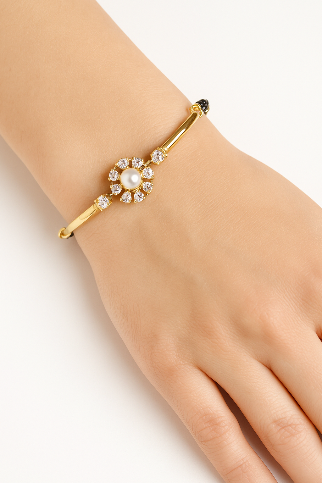 92.5 Gold Polished Najariya Bracelet featuring a white pearl and CZ stone floral design