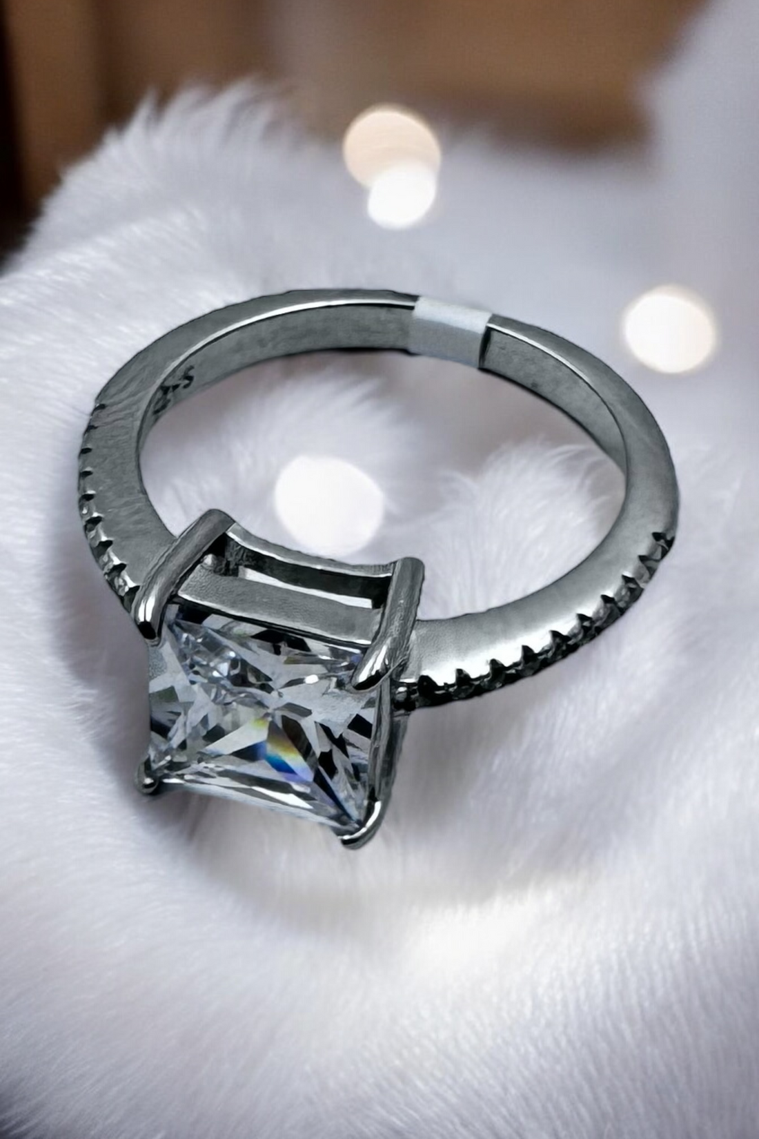 Princess cut solitare look sarvoski studded ring in 92.5 HM Silver