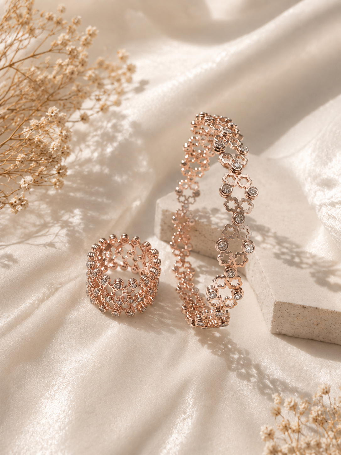 Premium floral design rose gold bracelet with crystal accents on satin fabric