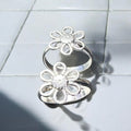 Traditional silver floral toe ring design