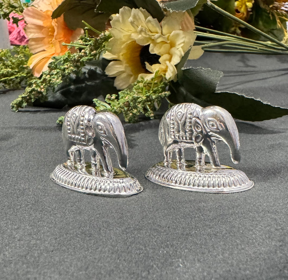 pure silver elephant idol with upward and downward trunk variants