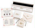 Silver House ASG jewelry packaging set featuring a white presentation box with a black interior, a white branded box, a cream drawstring pouch, a card of authenticity with pink floral accents, and care tips card, all arranged on a white background.