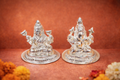 Silver Laxmi Ganesh statue with lotus design