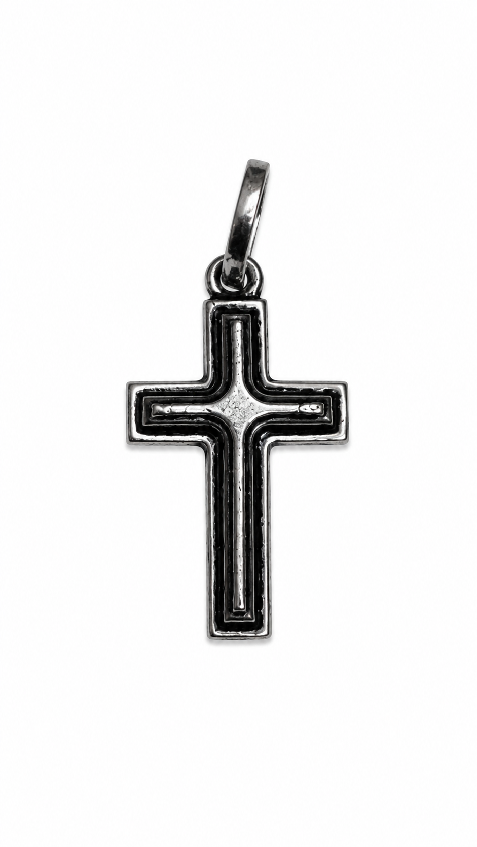 Silver cross pendant on a white background