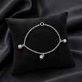 Modern silver chain bracelet with charm